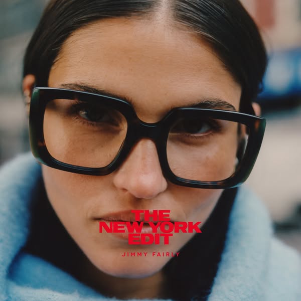 A closeup of a model wearing Jimmy Fairly eyeglasses, with text that reads "THE NEW YORK EDIT" and the brand n