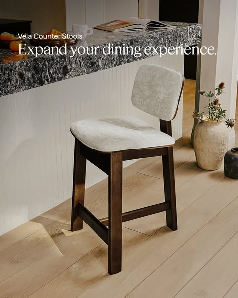 This ad showcases the Vela Counter Stools in a bright and airy kitchen setting, emphasizing their role in enhancing the 
