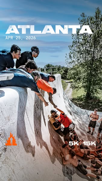 This image ad promotes the Tough Mudder Atlanta event on April 25, 2026, featuring participants helping each other over 