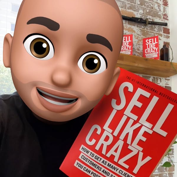 This ad features a person holding the book "Sell Like Crazy" by Sabri Suby. The ad is likely intended to promo