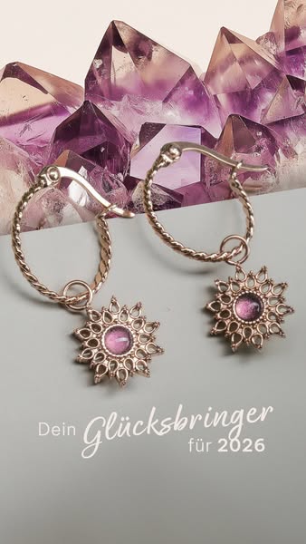 This ad showcases a pair of earrings with a sun-shaped charm. The ad is promoting the earrings as a lucky charm for 2026