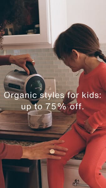 This ad features a mother and daughter in their kitchen. The mother is pouring water from a kettle into a bowl, while th