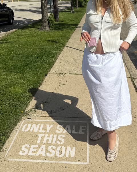 This ad features a person in front of sidewalk text to promote a sale.