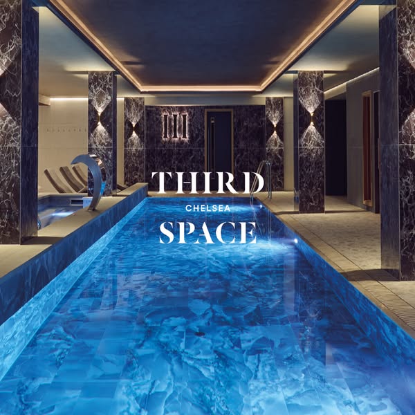 This image ad for Third Space Chelsea shows an indoor pool, with the brand name over the top of the image. The ad is int