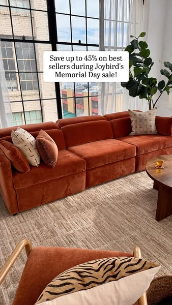 This image ad for Joybird promotes a Memorial Day sale on their best-selling furniture, featuring a large orange modular