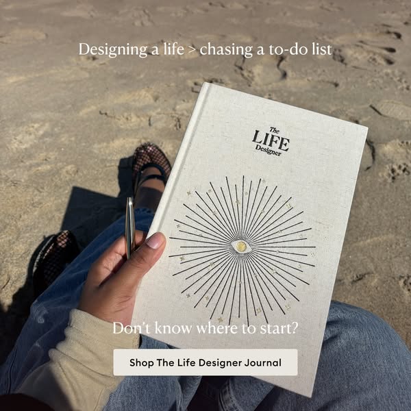 This ad for The Life Designer Journal uses a lifestyle image of a woman sitting on a beach with the journal in her lap, 