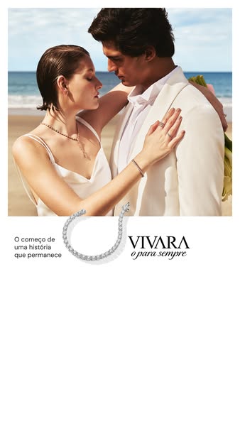 This ad features a romantic shot of a couple on the beach, likely on their wedding day, to promote Vivara jewelry. The a