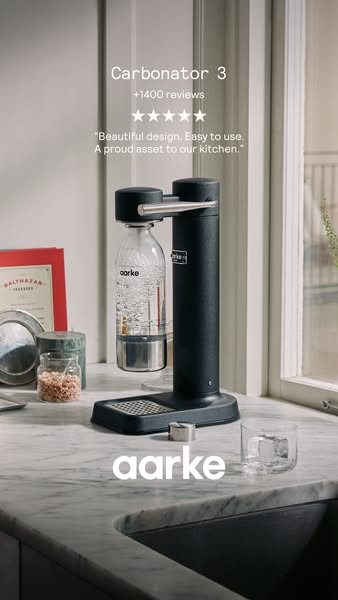 This image ad for Aarke features the Carbonator 3 sparkling water maker. The ad highlights the product's design and 