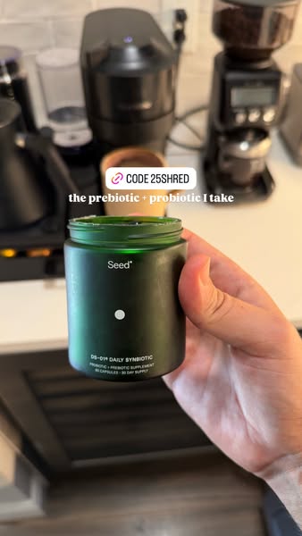 This ad features a person holding a container of Seed DS-01 Daily Synbiotic probiotic supplement. The ad includes a disc