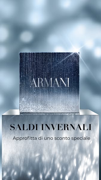 This ad promotes a winter sale on Armani products, with a metallic blue theme.