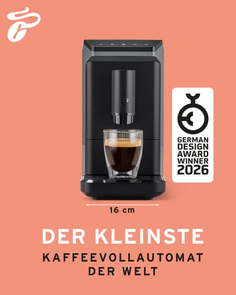 This image ad showcases the compact design and award-winning status of the Tchibo fully automatic coffee machine.