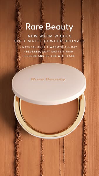 This image ad showcases Rare Beauty's Warm Wishes Soft Matte Powder Bronzer, emphasizing its natural, sunlit finish 