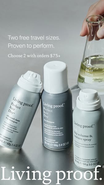 This ad promotes Living Proof dry shampoo. It shows three travel-size Living Proof dry shampoos with a hand holding a fl
