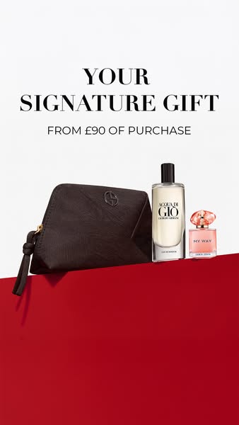 This image ad promotes a gift with purchase from Giorgio Armani. The ad features a makeup bag, along with two Giorgio Ar