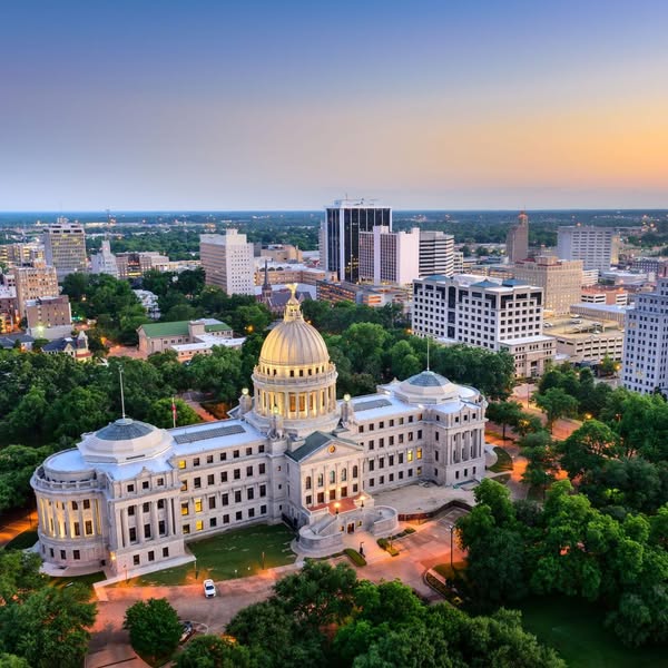 This image ad features a cityscape with a large building. The ad does not include any product promotion, offer, or call 