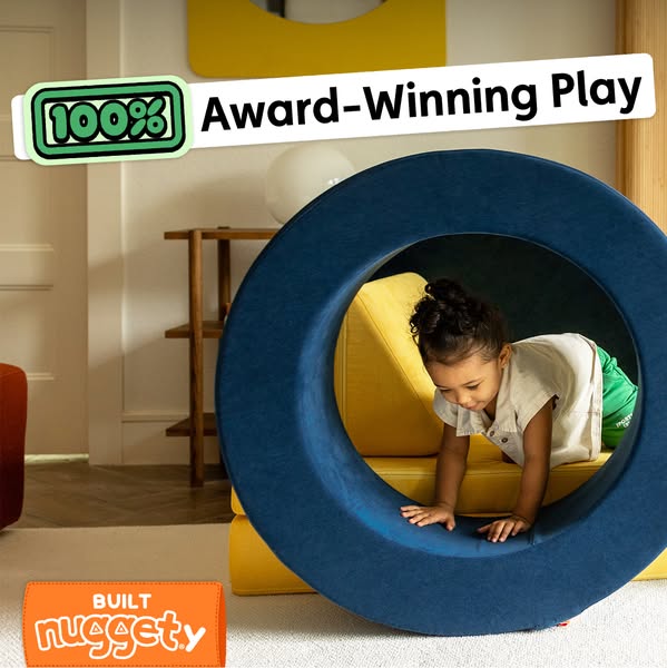 This image ad shows a little girl playing with a blue circular Nugget couch piece, along with other modular pieces from 