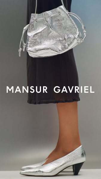 This ad showcases a silver metallic bucket bag and matching heels from Mansur Gavriel. The ad focuses on the texture and