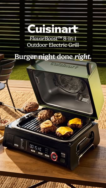 This image showcases a Cuisinart FlavorBoost™ 8-in-1 Outdoor Electric Grill with burger patties cooking on the grill. Th