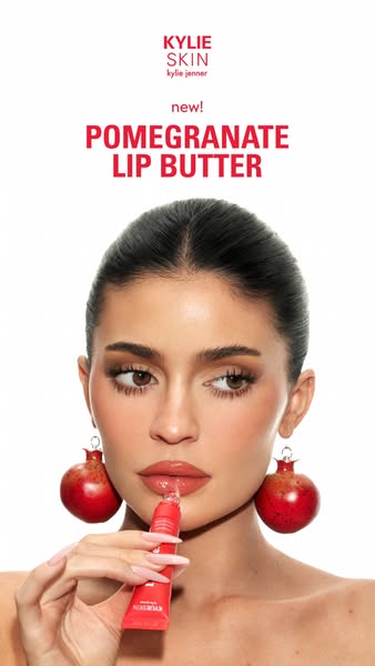 This ad by Kylie Skin promotes the new Pomegranate Lip Butter. The ad features Kylie Jenner holding and applying the lip