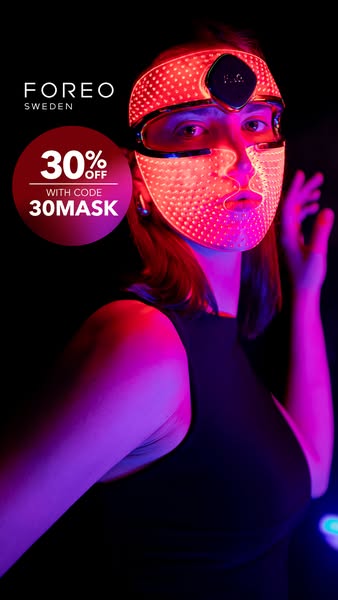 This image ad for Foreo promotes the brand's LED light therapy mask with a discount code. The ad features a model we