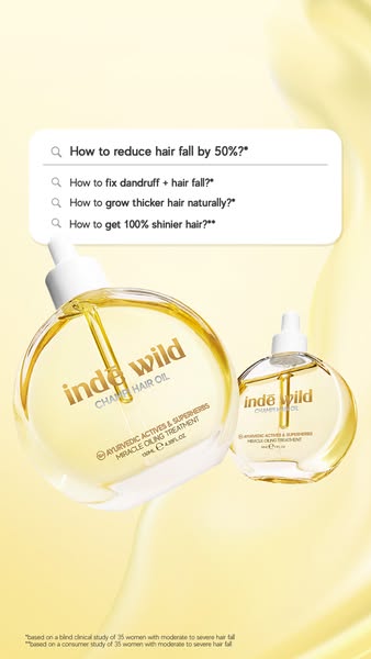 The image ad showcases Inde Wild hair oil as a solution to common hair problems, specifically hair fall, dandruff, and l