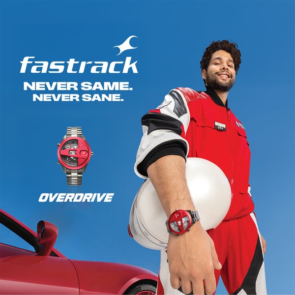 The ad features a man with a helmet who is wearing a Fastrack watch. The ad copy is "Never Same. Never Sane."