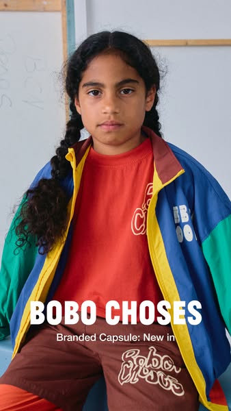 This ad features a child wearing a colorful outfit from Bobo Choses, showcasing the brand's latest collection. The f