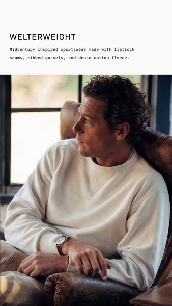 This ad features a mid-century inspired sweatshirt from Welterweight. The ad showcases a man wearing the sweatshirt indo