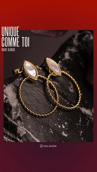 This ad showcases HolzKern earrings, highlighting their unique design.