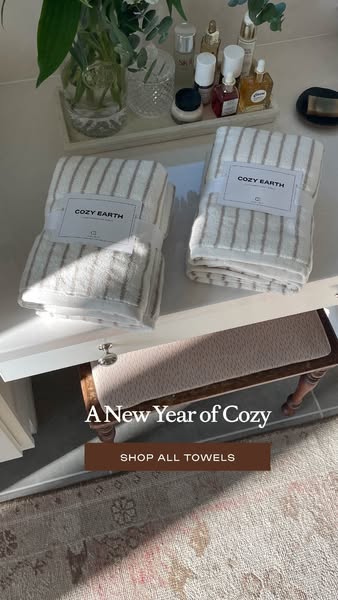 This Cozy Earth ad features a neatly styled bathroom setting to showcase the brand's towels. The image focuses on th