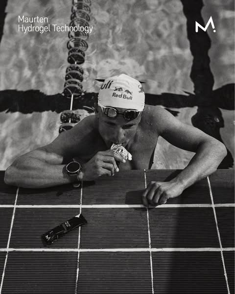 An image ad features a swimmer using Maurten energy gels. The black and white aesthetic conveys a serious tone, emphasiz