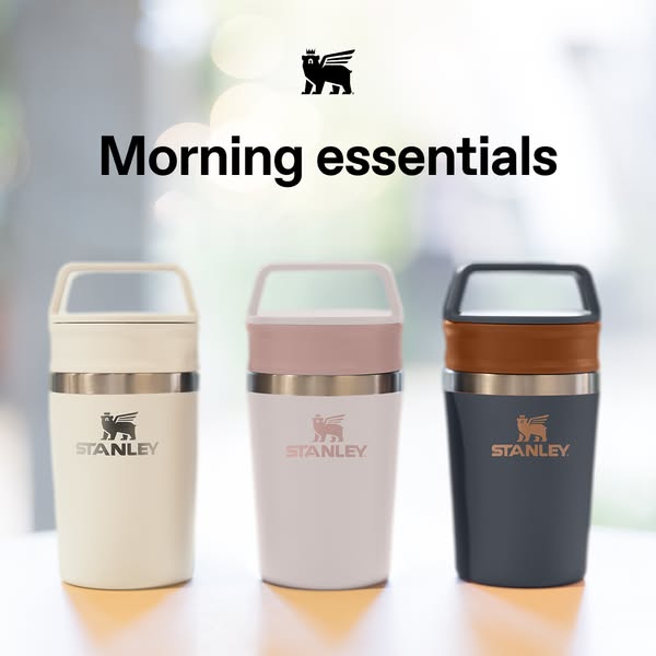 This ad showcases three Stanley insulated mugs in different colors, emphasizing their appeal as morning essentials.
