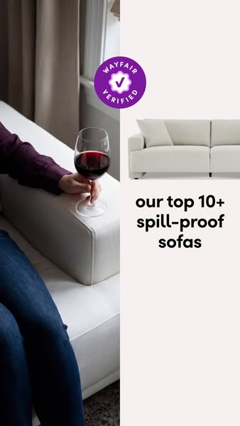 This ad promotes Wayfair's top 10+ spill-proof sofas. The ad features a person sitting on a white sofa with a glass 