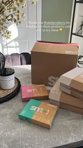 This ad features a photo of a box of Smol products, sent to a customer who is excited to try them.