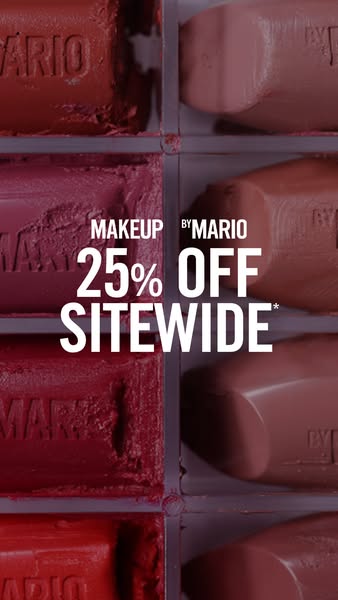 This ad by MAKEUP BY MARIO advertises a 25% off sitewide sale. The ad image features lipstick bullets in a grid layout.