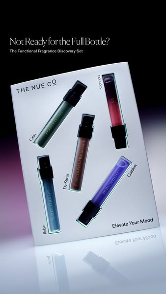 This ad promotes The Nue Co's Functional Fragrance Discovery Set. The ad features a close-up product shot against a 