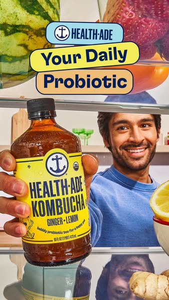 This ad for Health-Ade Kombucha features a man reaching into a refrigerator to grab a bottle of the product. The ad high