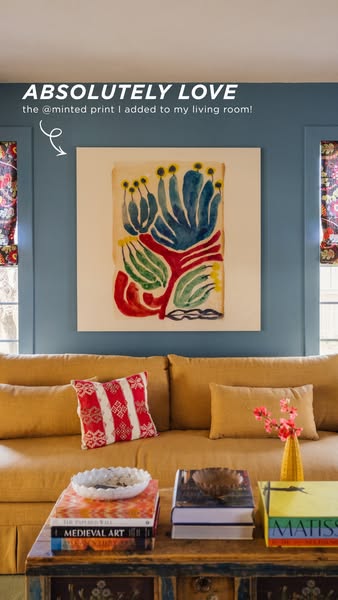 This ad shows a user's living room and highlights art print from Minted. The print is added to the wall above the co