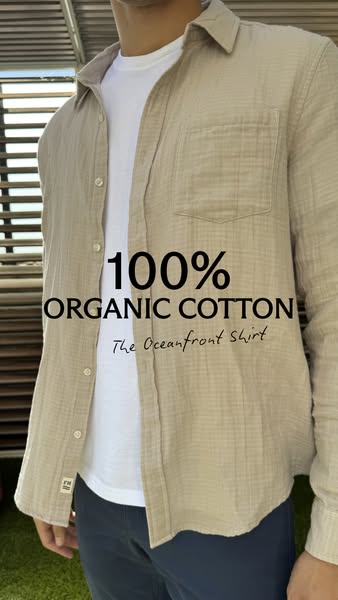 An image ad showing a man wearing a button-down shirt, unbuttoned over a t-shirt. Text overlayed on the image highlights