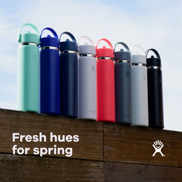 This ad showcases a lineup of Hydro Flask water bottles in various colors, highlighting the brand's spring collectio