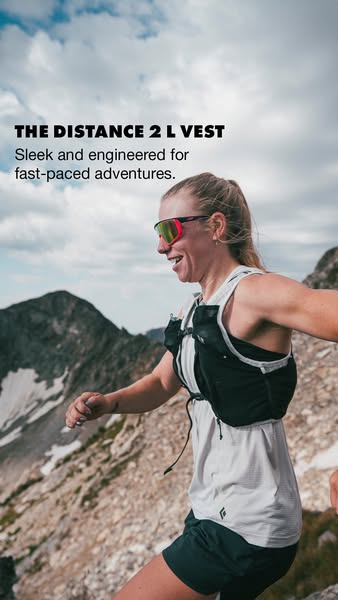 This image ad promotes the Black Diamond Distance 2 L Vest. It features a woman on a mountain trail wearing the vest. Th