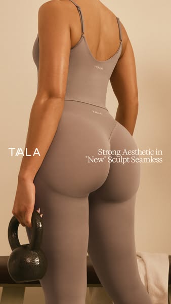 This ad features a model wearing sculpting activewear while holding a kettlebell and highlights the brand's strong a