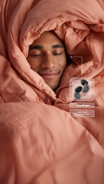 This ad features a man resting, wrapped in a blanket, and an annotation highlights the product, Loop Dream earplugs for 