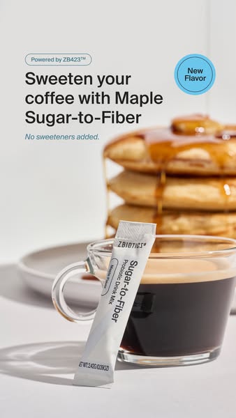 This image ad promotes ZBIOTICS Sugar-to-Fiber Maple flavor drink mix. The ad shows a packet of the mix leaning against 