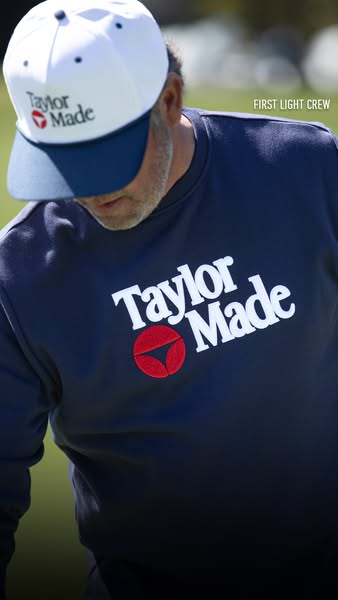 This image ad showcases a man wearing a TaylorMade cap and sweatshirt with the brand name prominently displayed. The ad
