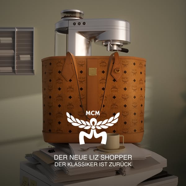 This ad promotes MCM's Liz Shopper bag by showcasing it in a stylized, upscale environment.