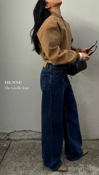 The ad showcases the Henne Gisella Jean through a lifestyle image featuring a model wearing the jeans with a neutral bac