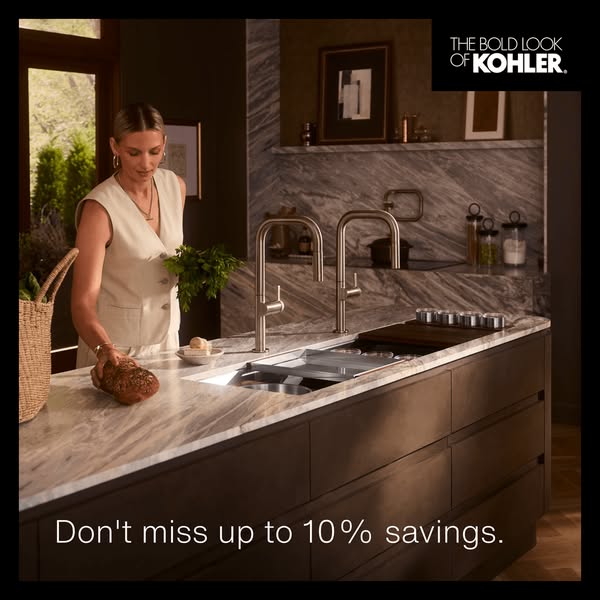 This image ad promotes Kohler kitchen products. It features a woman in a stylish kitchen preparing food at a Kohler sink