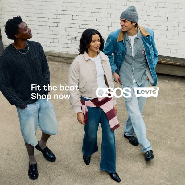 A contemporary ad featuring three young adults wearing Levi's clothing available through ASOS, set against an urban 