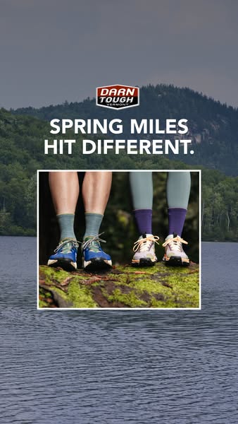The image ad for Darn Tough socks features two people wearing Darn Tough socks in a spring environment. The ad is meant 